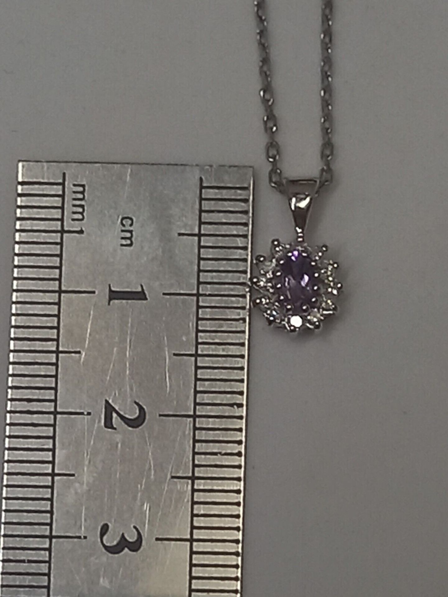 0.12CT DIAMOND & AMYTHIST PENDANT 9CT WHITE GOLD IN GIFT BOX + VALUATION CERTIFICATE OF £795 - Image 4 of 4