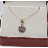 0.35CT CLUSTER DIAMOND PENDANT/9CT YELLOW GOLD IN GIFT BOX WITH VALUATION CERTIFICATE OF £1095