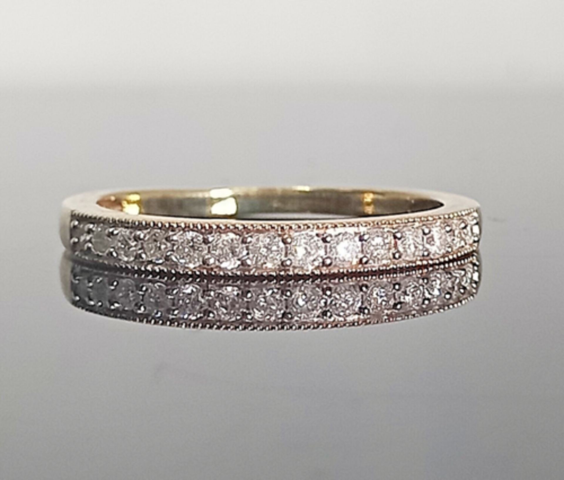 0.20CT DIAMOND ETERNITY RING/9CT YELLOW GOLD IN GIFT BOX WITH VALUATION CERTIFICATE OF £1195