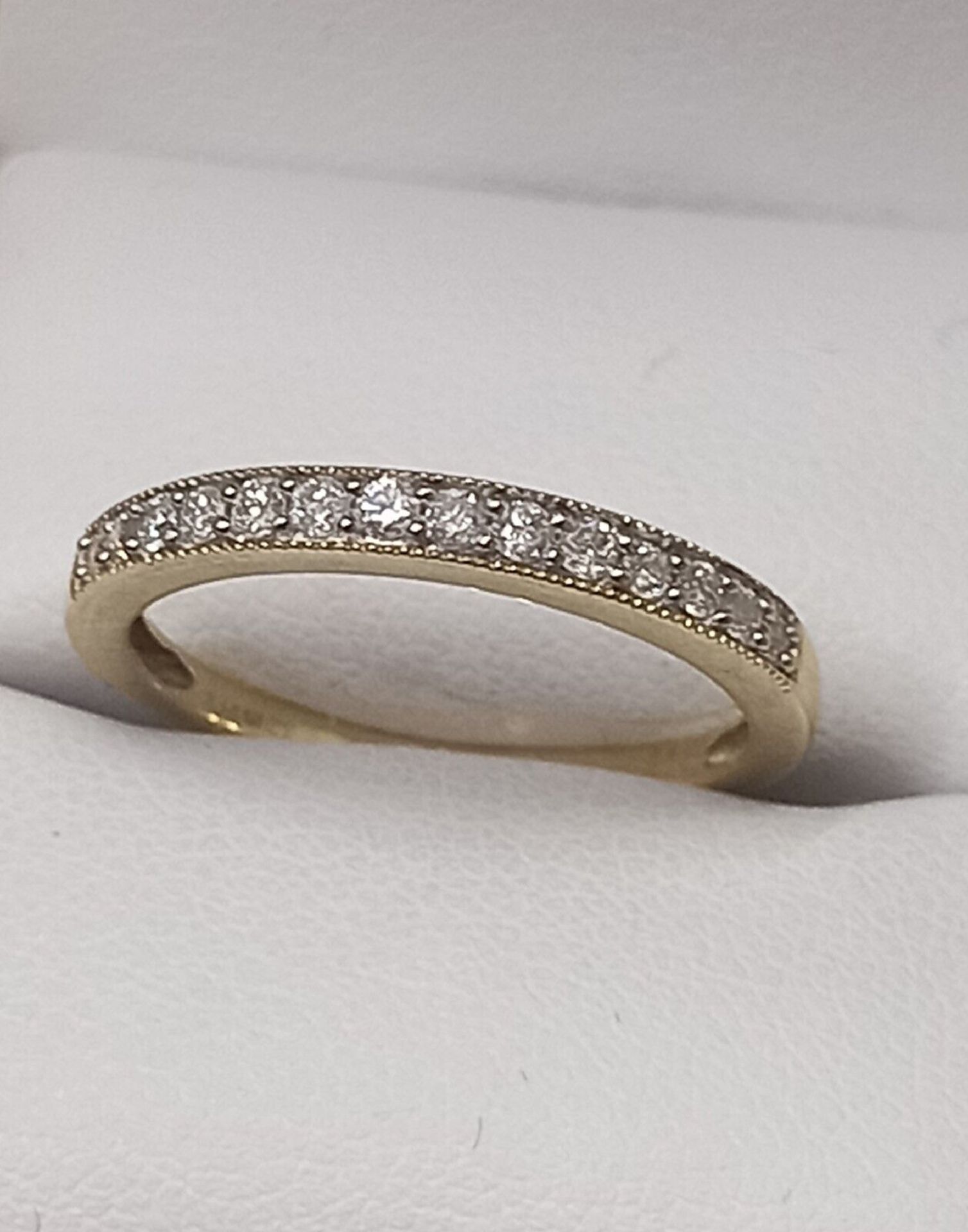 0.20CT DIAMOND ETERNITY RING/9CT YELLOW GOLD IN GIFT BOX WITH VALUATION CERTIFICATE OF £1195 - Image 4 of 5