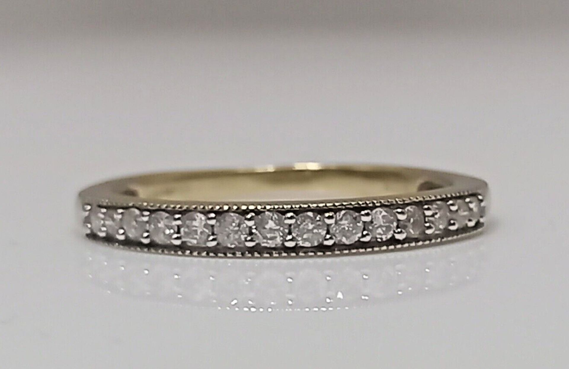 0.20CT DIAMOND ETERNITY RING/9CT YELLOW GOLD IN GIFT BOX WITH VALUATION CERTIFICATE OF £1195 - Image 3 of 5