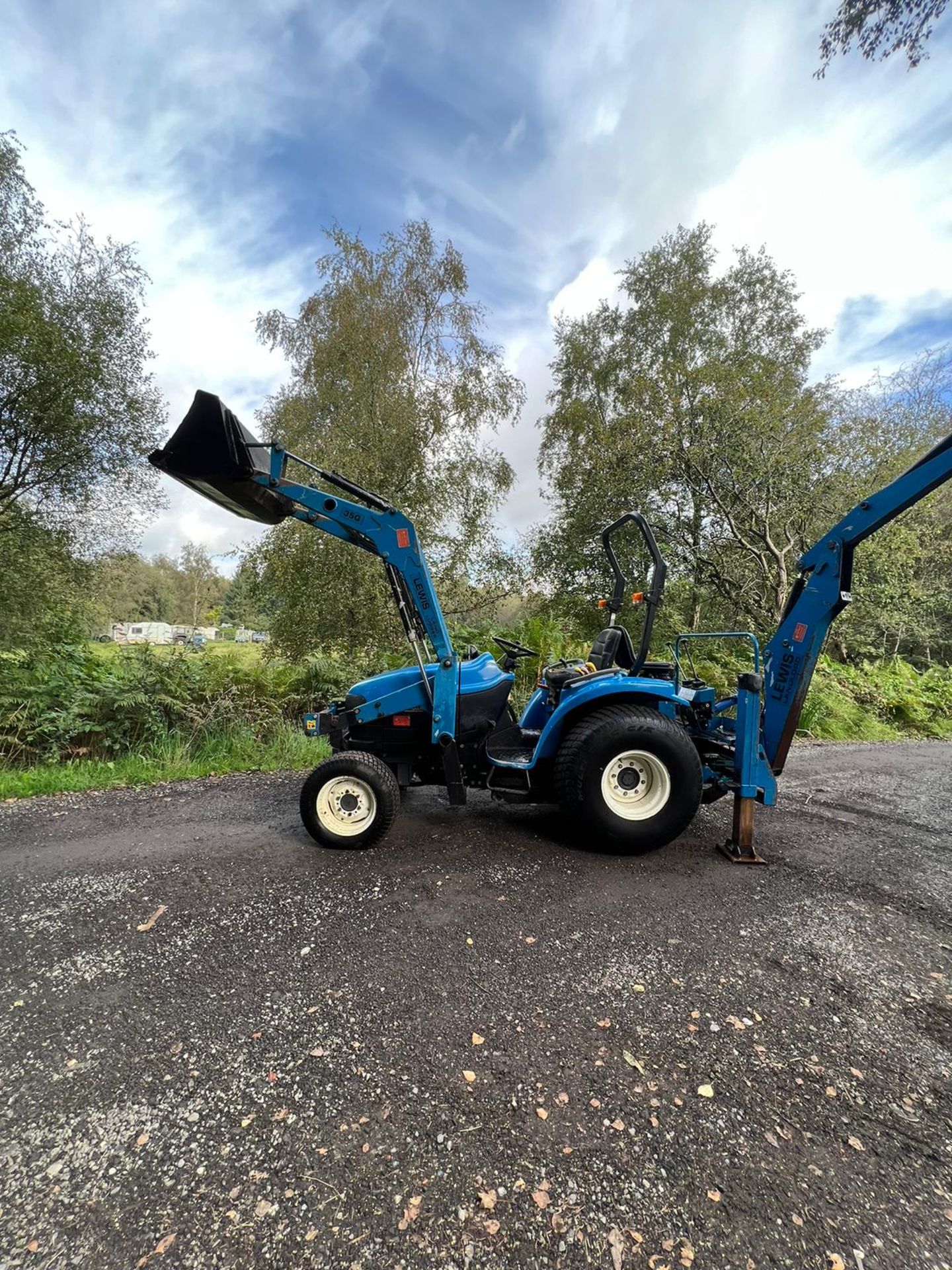 NEW HOLLAND TC27D BACK LOADER, SPOOL VALVE, ROLL PTO