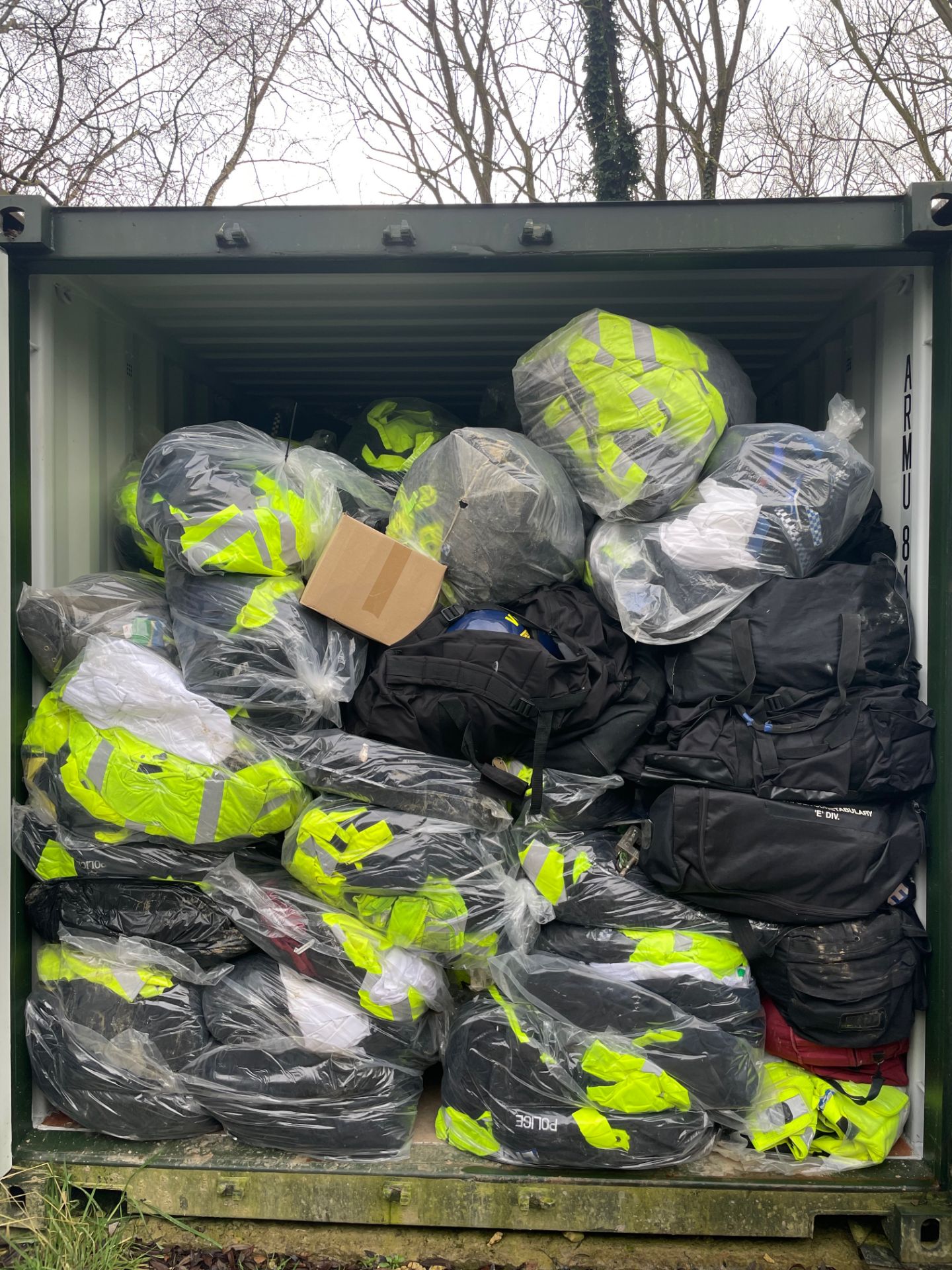 FULL CONTAINER LOAD OF POLICE CLOTHING APPROX 500 BAGS FULL - RRP £137,500 - NO VAT ON HAMMER