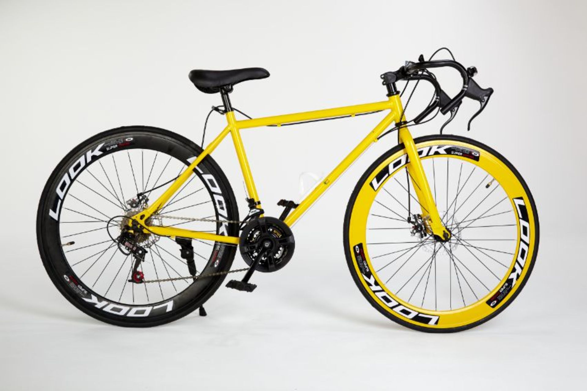 YELLOW STREET BIKE WITH 21 GREAR, BRAKE DISKS, KICK STAND, COOL THIN TYRES