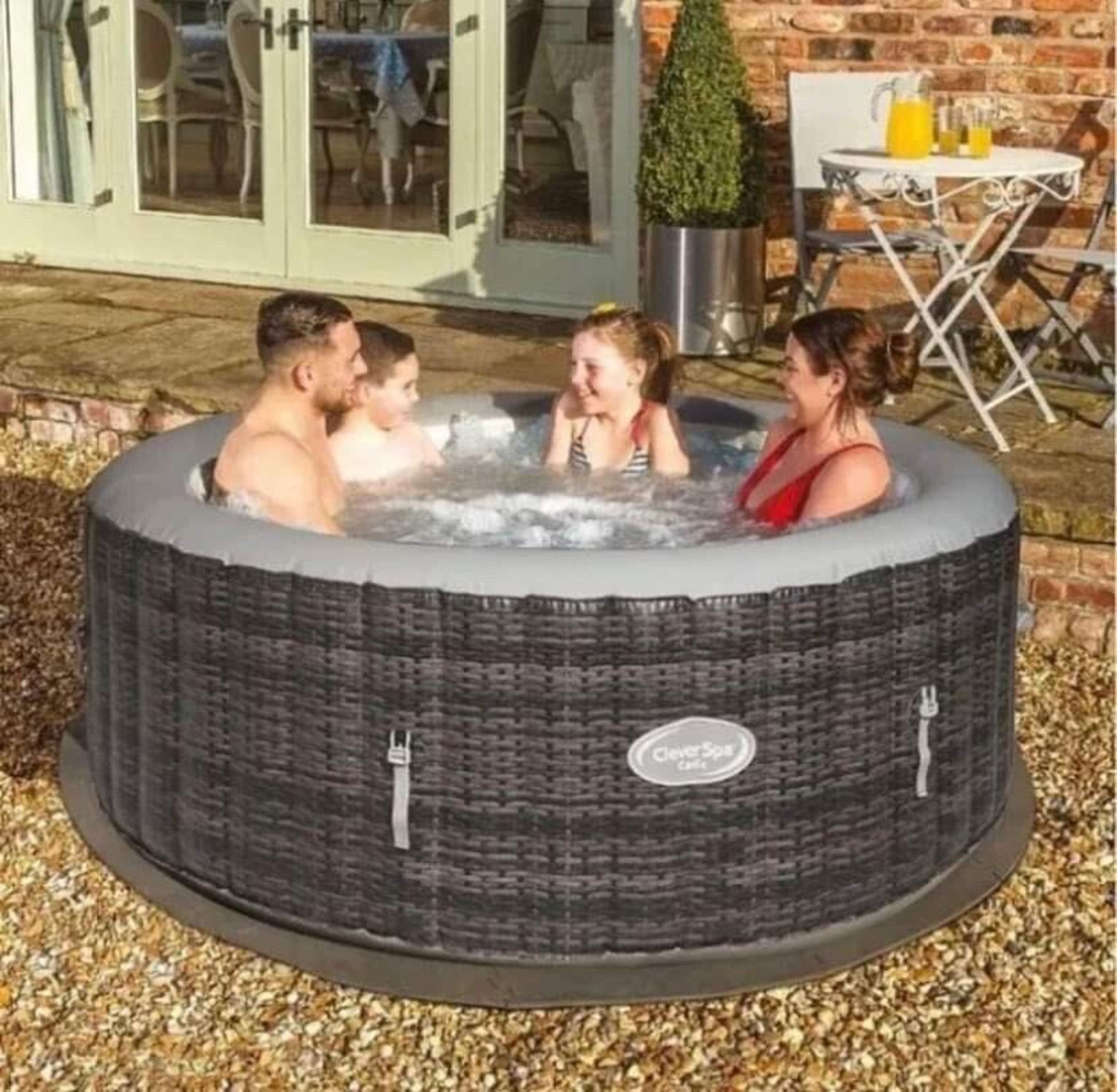 NEW CATIZ 4 PERSON JACUZZI - BUILT IN PUMP AND HEATER - 110 AIR JETS - INFLATES IN 5 MINUTES