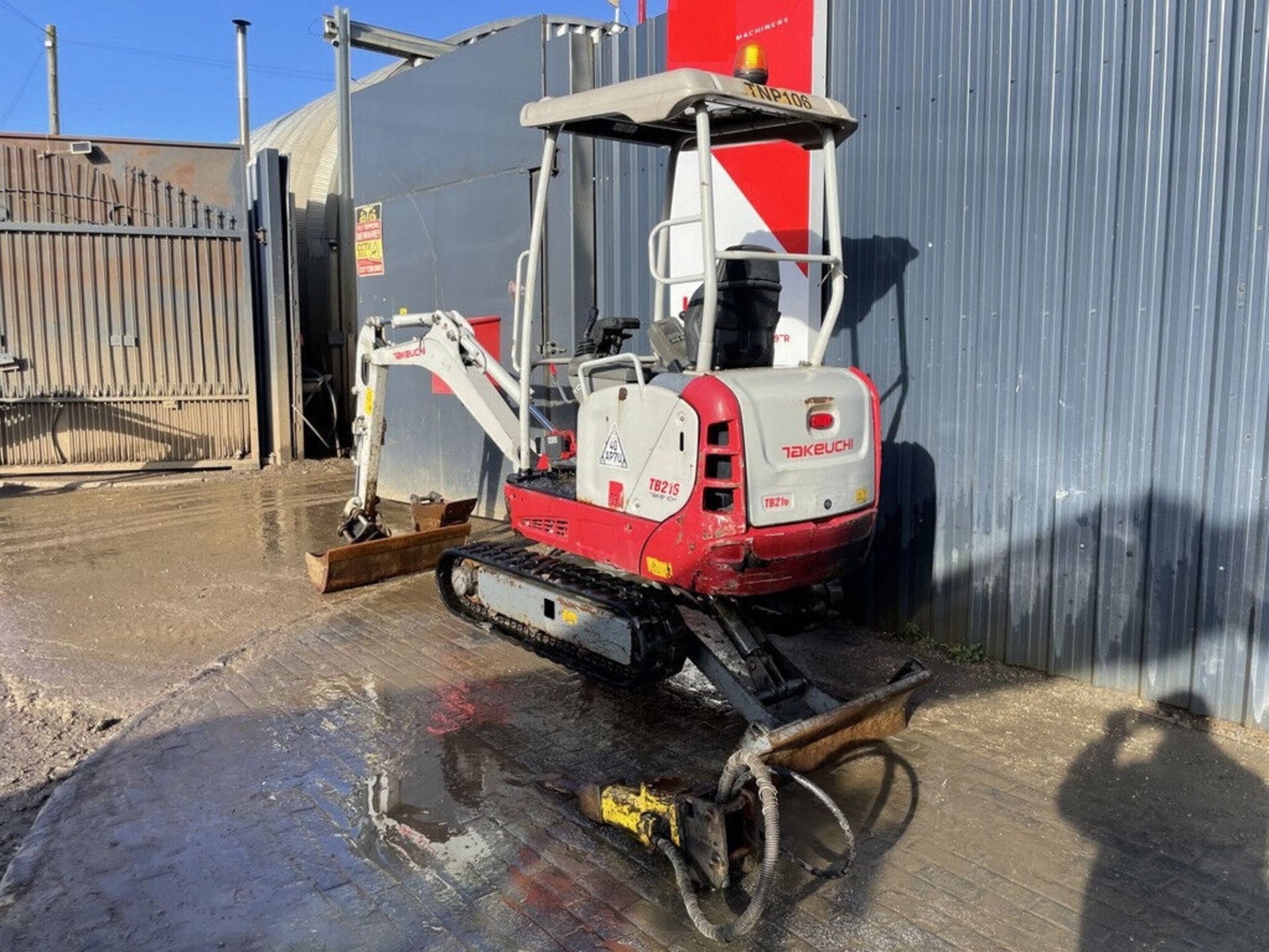 EFFICIENCY REDEFINED: 2017 TAKEUCHI TB216 WITH ATLAS COPCO BREAKER