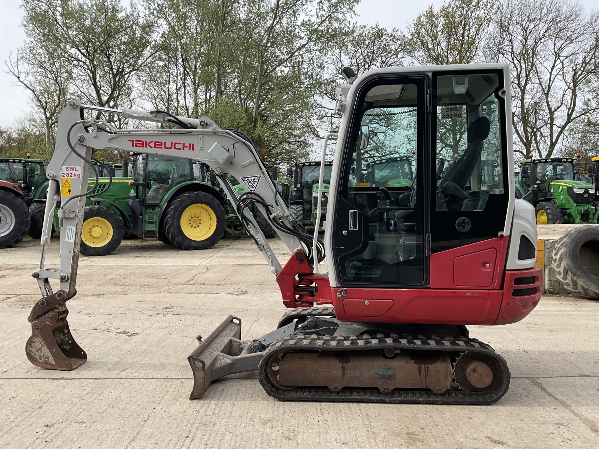 POWER AND PRECISION: TAKEUCHI TB230 MINI EXCAVATOR