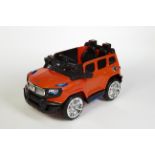 ORANGE KIDS ELECTRIC RIDE ON CAR WITH PARENTAL CONTROL BRAND NEW BOXED