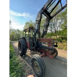 INTERNATIONAL 784 TRACTOR WITH QUICKE POWER LOADER 3360E
