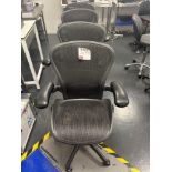 Herman Miller Aeron-style Four black mesh back operator chairs