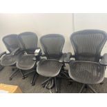 Herman Miller Aeron-style Four black mesh back operator chairs