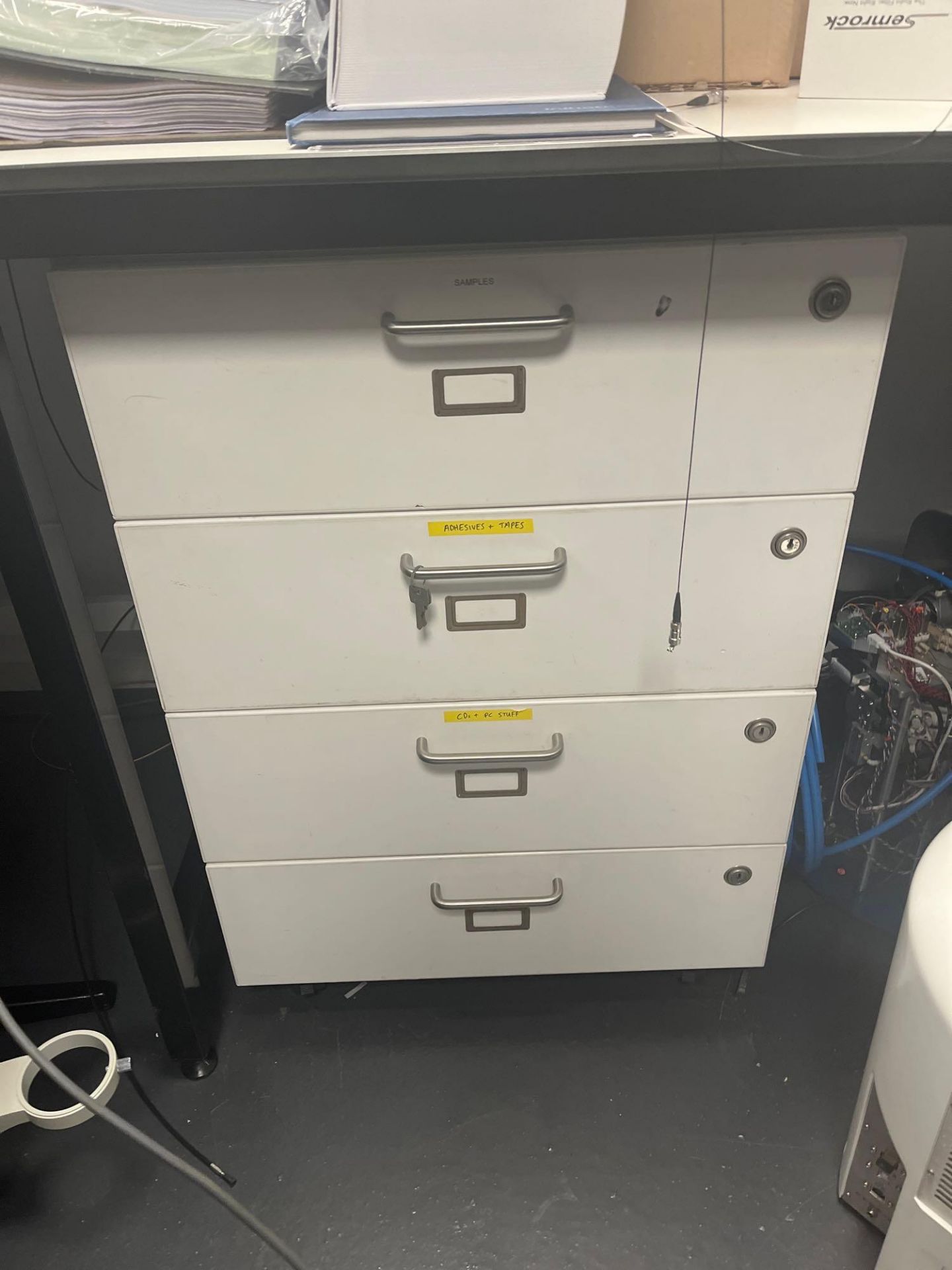 Two laboratory workbenches and contents comprising various consumables, white four drawer cabinet an - Image 3 of 6