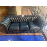 Chesterfield style blue leather upholstered three seater sofa