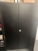 Manutan black metal two door cabinet and contents comprising a quantity of various screws, fixings,