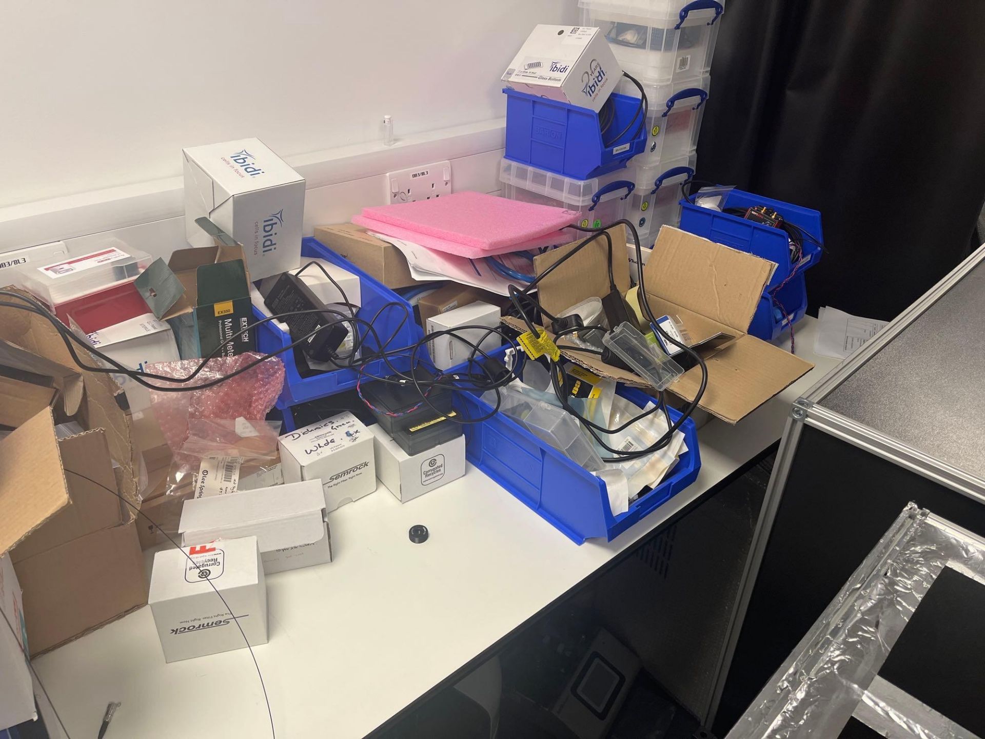 Two laboratory workbenches and contents comprising various consumables, white four drawer cabinet an - Image 2 of 6