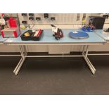 White laboratory workbench with four fitted plug inputs (excludes contents) (approximately 182cm L x