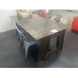 Industrial style welded table with four various industrial style chairs (approximately 170cm L x 90c