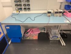 White laboratory workbench with four fitted plug inputs (excludes contents) (approximately 182cm L x