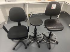 Two black chairs with stall