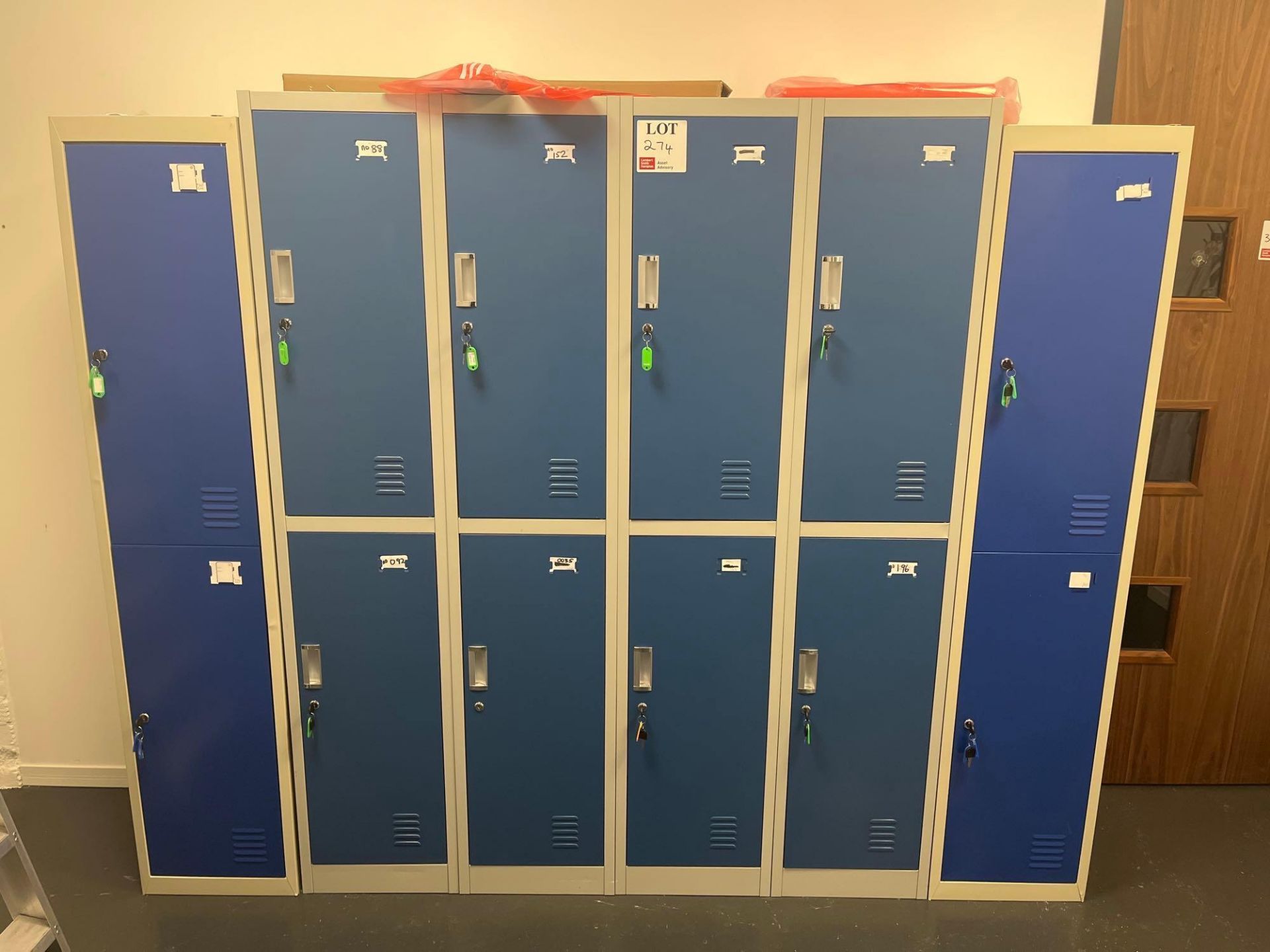 Eight-bay locker unit with two two-bay locker units