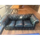 Chesterfield style blue leather upholstered three seater sofa