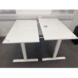 Two white adjustable height desks (excludes contents) (approximately 120cm L x 70cm W)