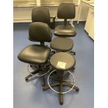 Three SummitChairs black leather upholstered chairs with two various black stools