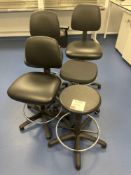 Three SummitChairs black leather upholstered chairs with two various black stools