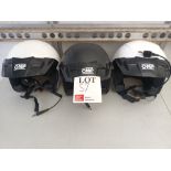 Three various OMP rally crash helmets