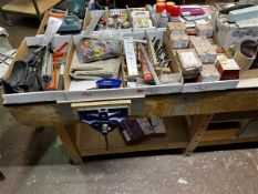 Four boxes of assorted sundries to include drill bits, packers, screws and letter stamps