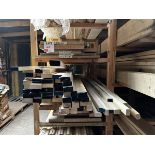 One bay of various size & lengths of sold timber