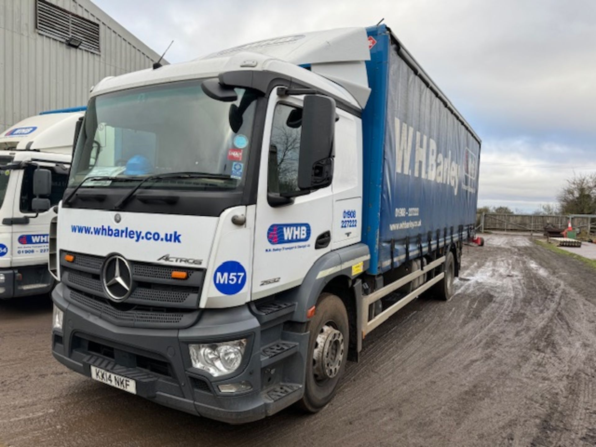 Mercedes euro 6 26t curtainside lorry with foldaway tail lift and rear mounted Manitou attachment