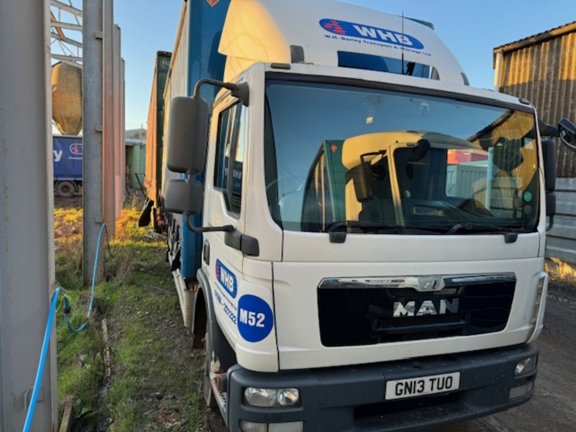 MAN euro 5 12t curtainside lorry with foldaway tail lift