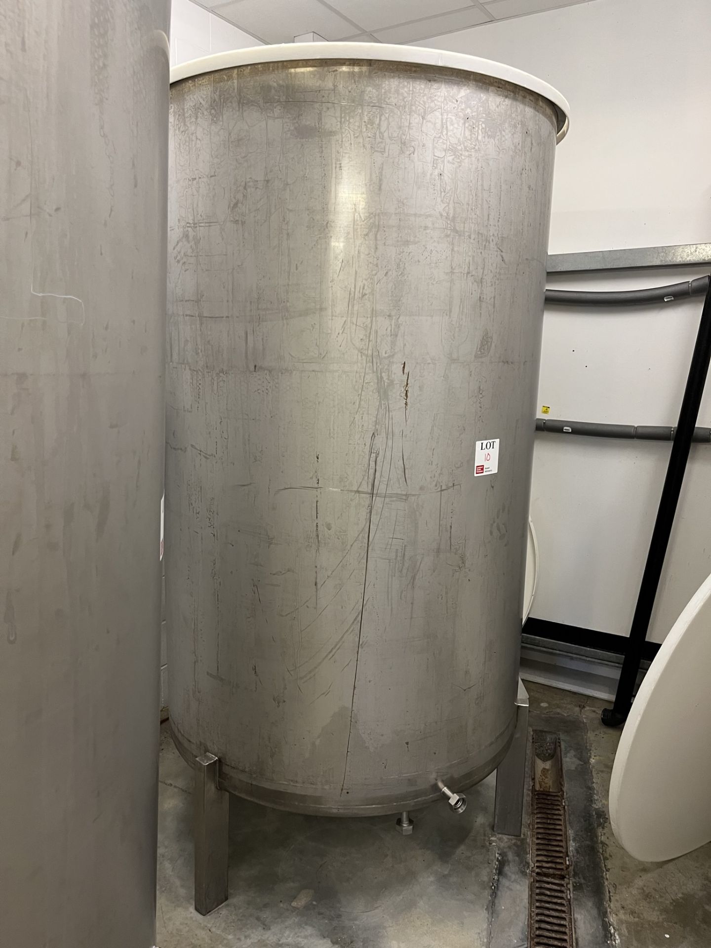 Stainless steel single skin liquid storage vessel.