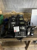 Eight desktop phones, two handheld land lines and two headsets