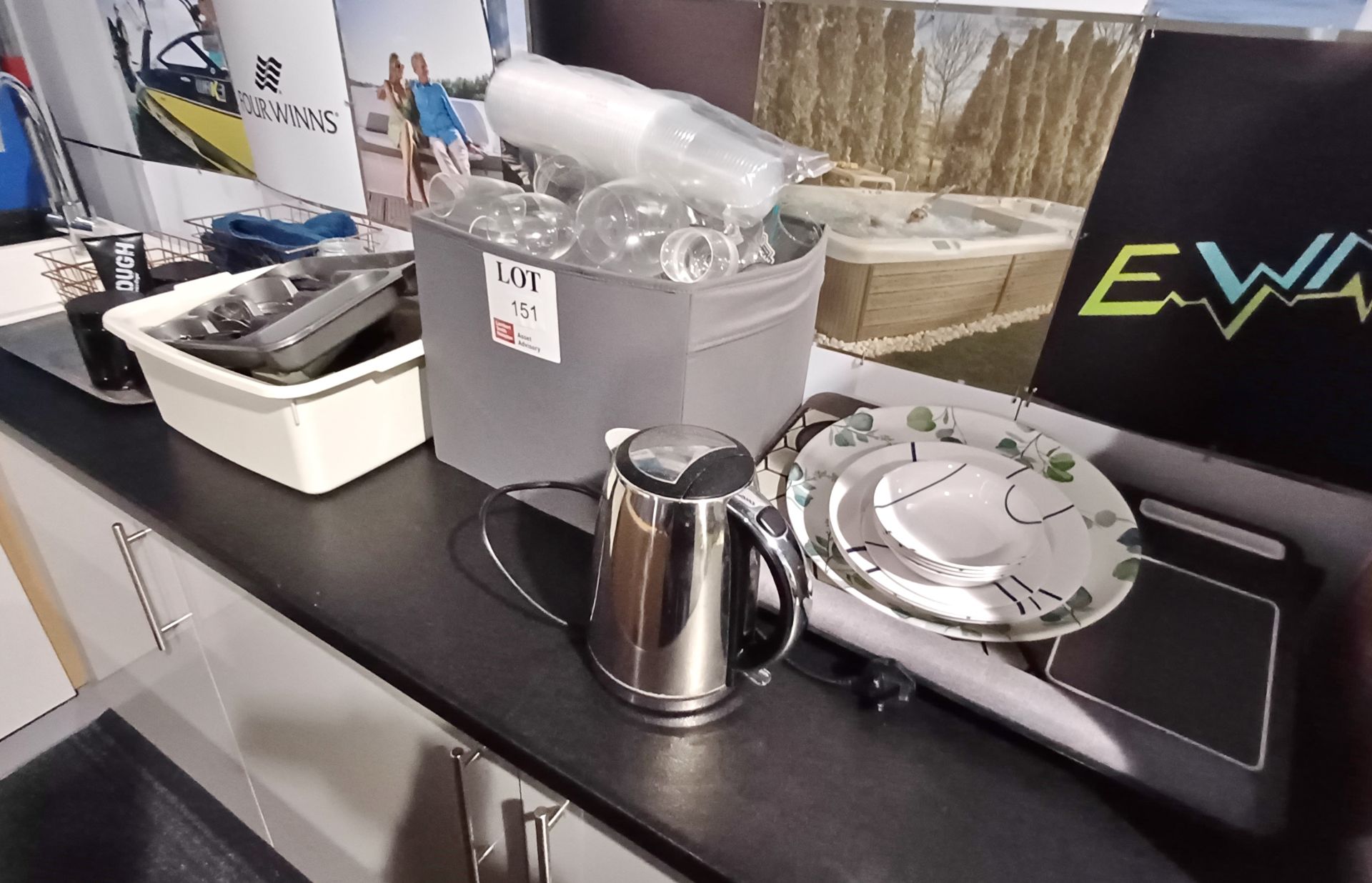 Quantity of various kitchenware to worktop including kettle, glasses, cutlery etc.