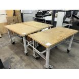 Three timber top metal mobile work benches
