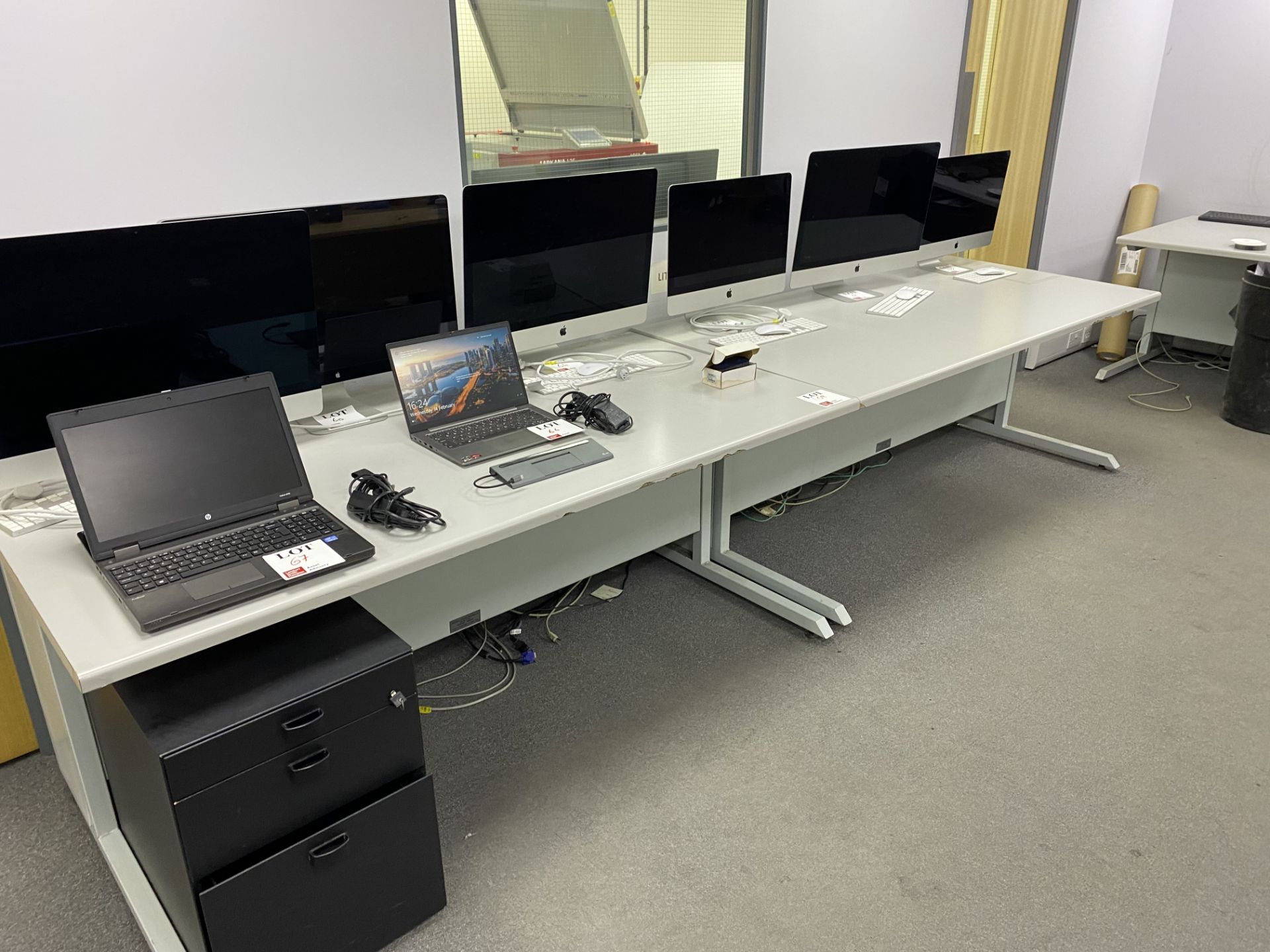 Two grey office desks