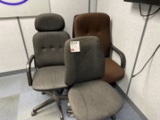 Five various upholstered swivel office chairs
