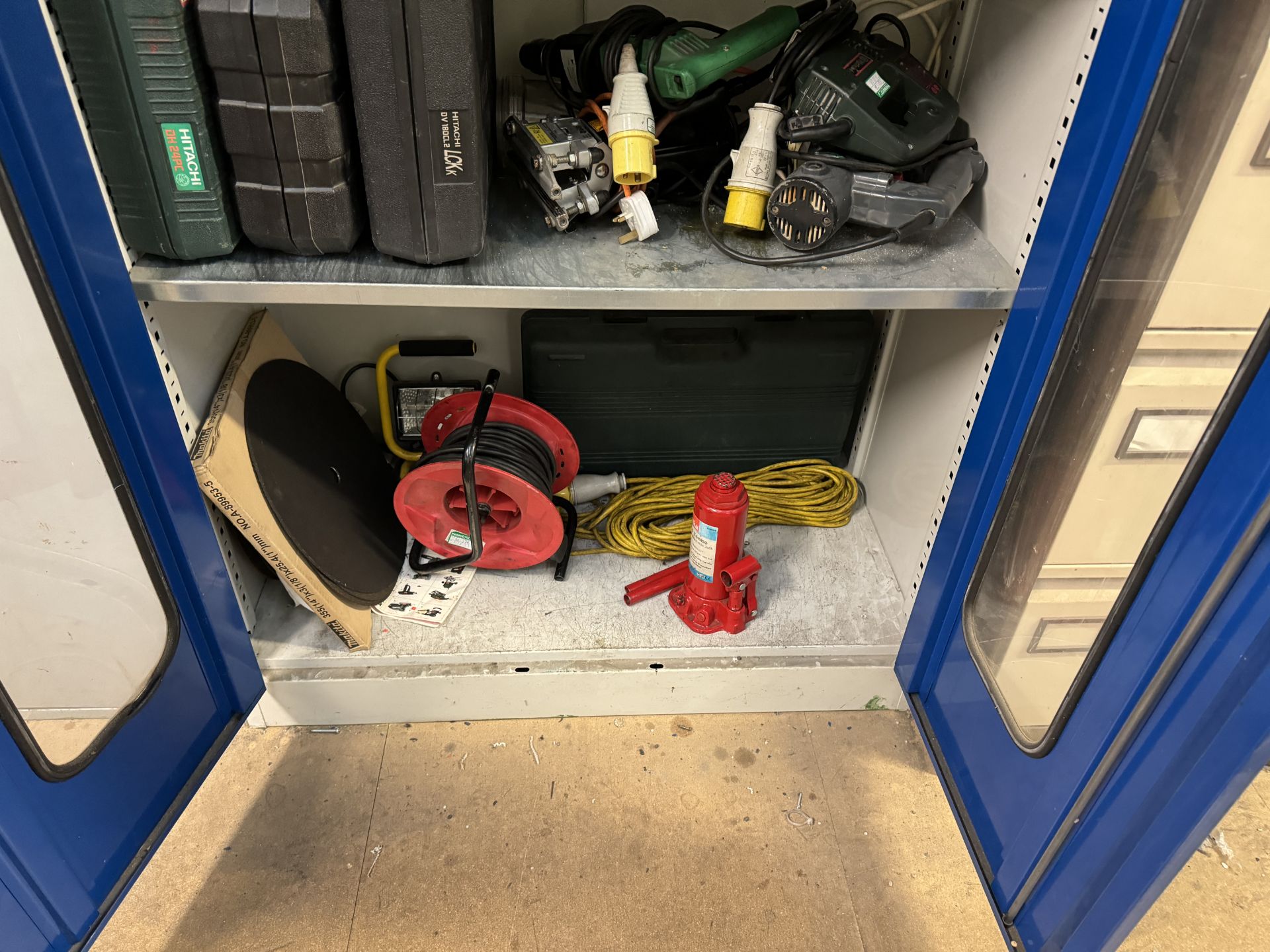 Metal 2 door storage cupboard with contents including tools boxes, 110v tool spares, extension - Image 5 of 6