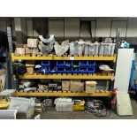 Bay of racking with contents including assorted extruder spare parts and accessories, racking