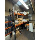 Bay of racking with contents including assorted consumable spares, Phillips light tubes etc, racking