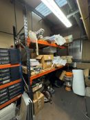 Bay of racking with contents including assorted consumable spares, Phillips light tubes etc, racking