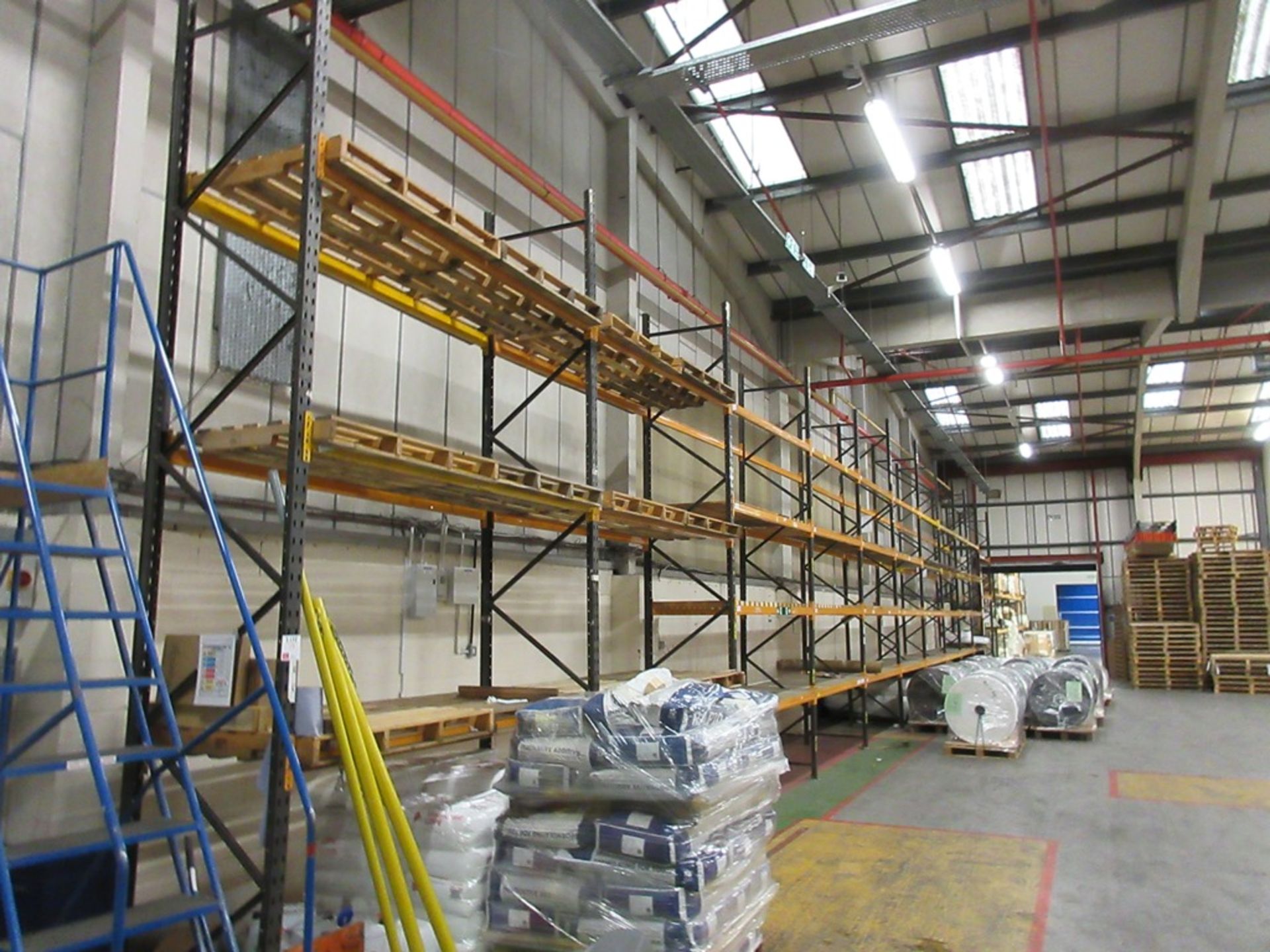 Eleven bays of boltless adjustable pallet racking, approx. sizes: 2.6m x 900mm x H: 5.5m A work