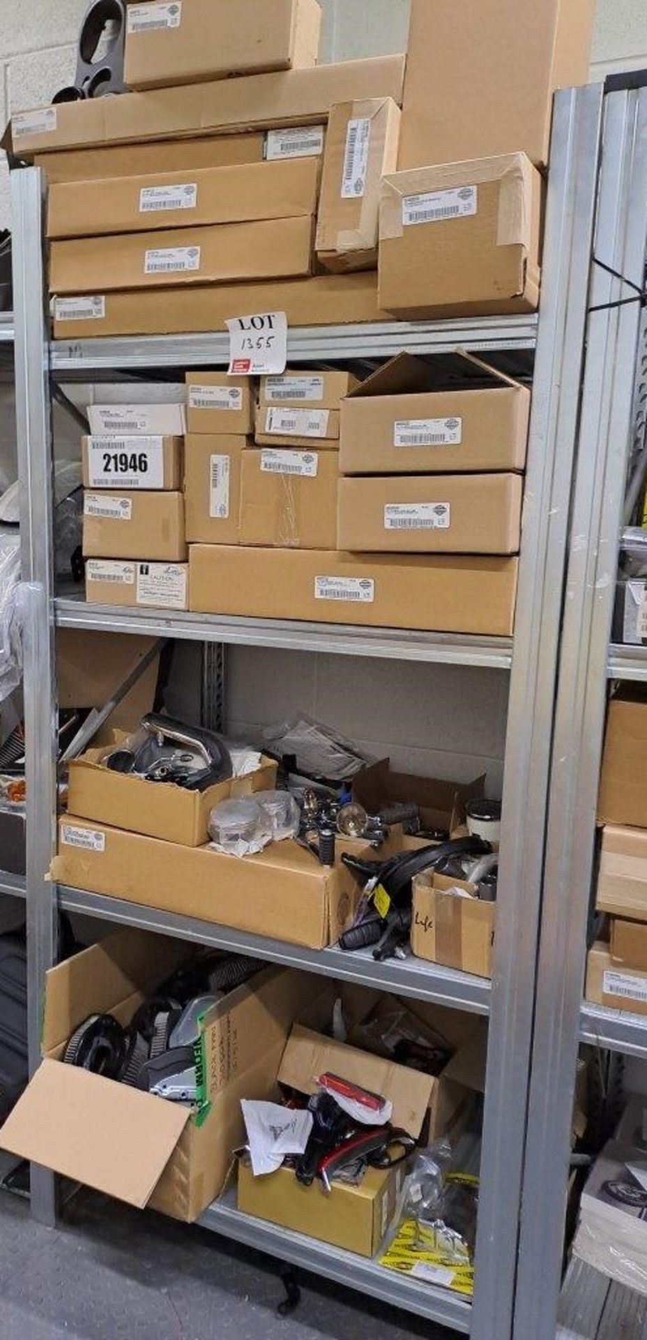 Quantity of Harley Davidson parts, to 4 shelves as pictured