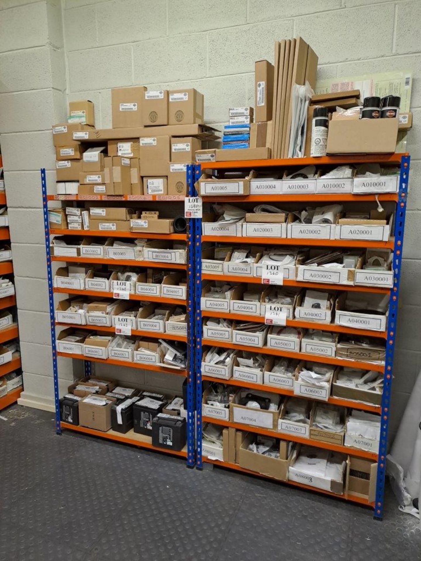 9 Bays of Blue and orange shelving, througout stores and workshop