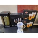 3 sets of Harley Davidson glasses, a Harley Davidson flask and a Harley Davidson mug