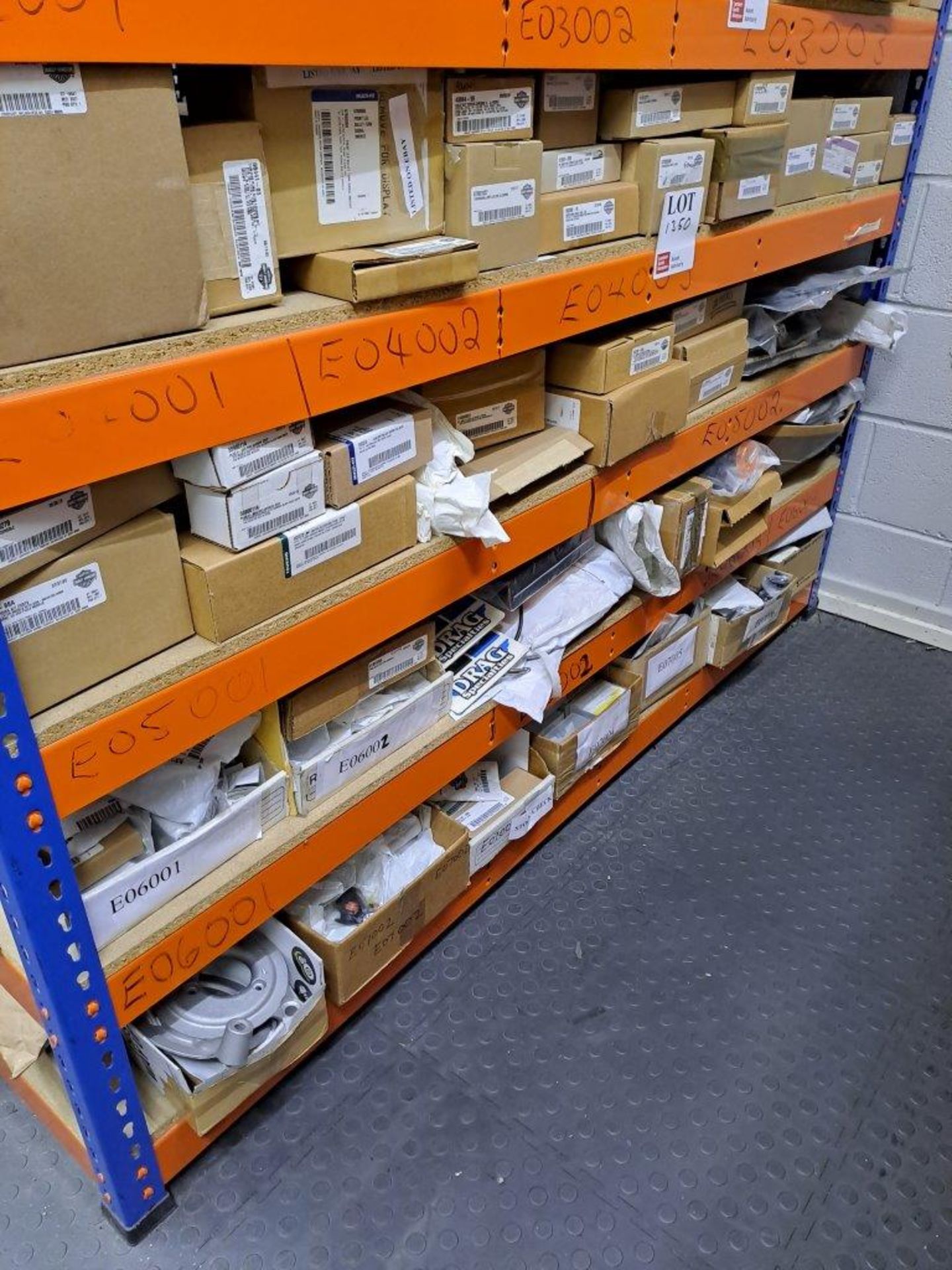 Quantity of Harley Davidson parts, to 4 shelves as pictured