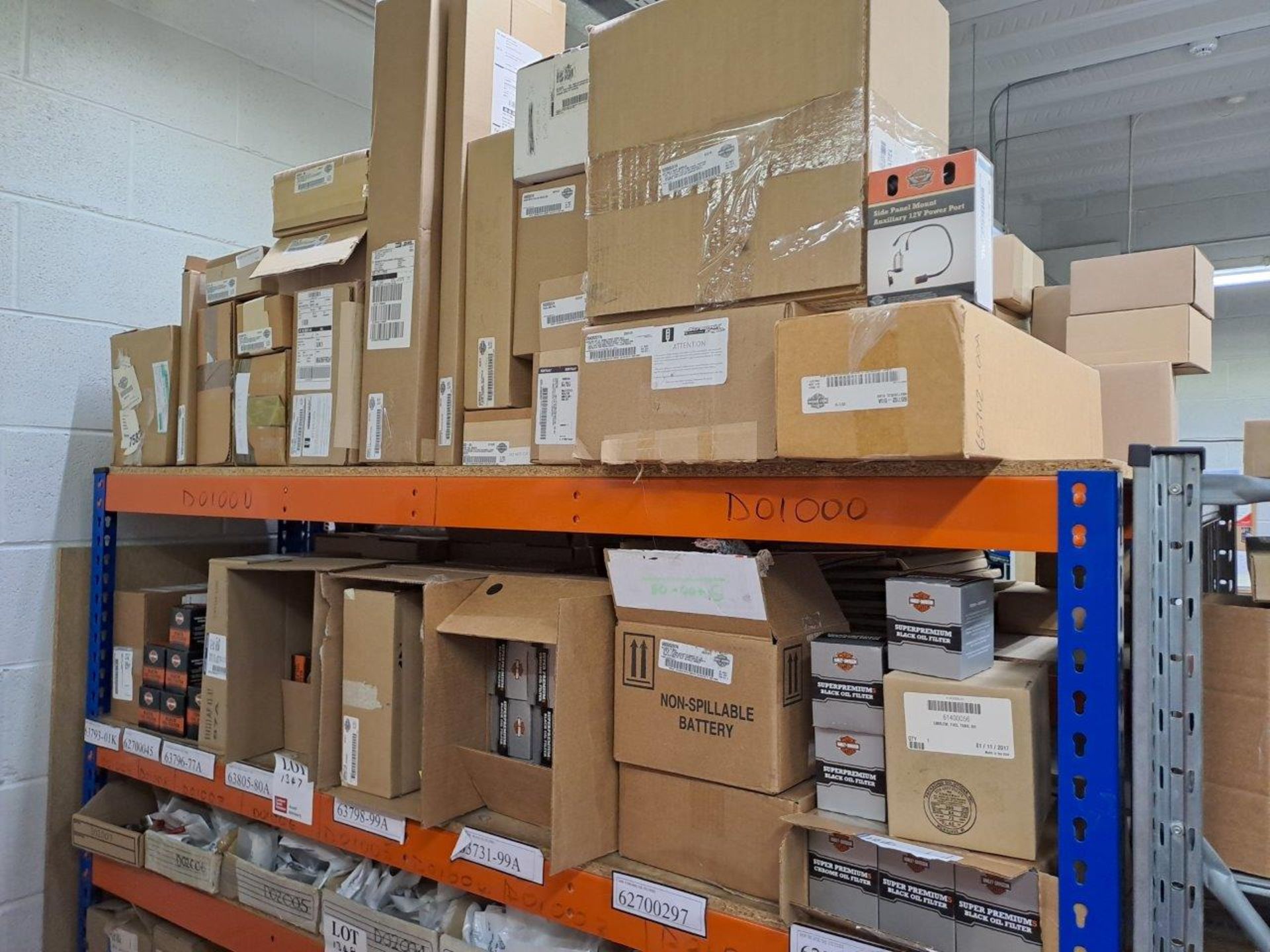 Quantity of Harley Davidson parts, to 2 shelves as pictured