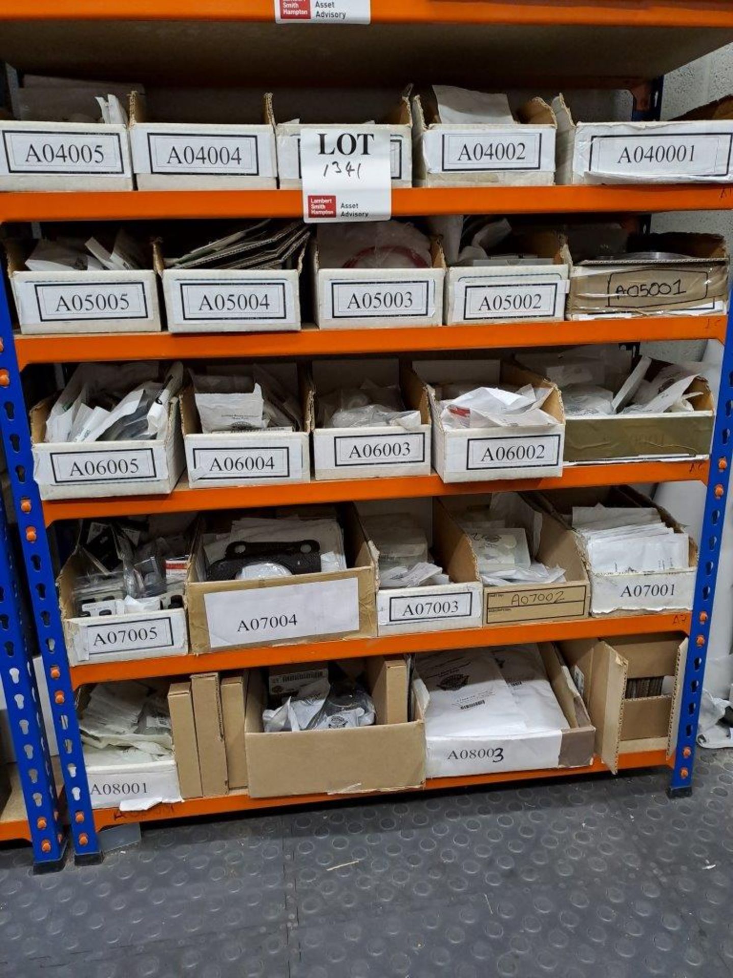 Quantity of Harley Davidson parts, to 5 shelves as pictured